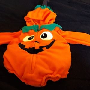 9-12 month Halloween costumes. Pumpkin and WonderWomen.